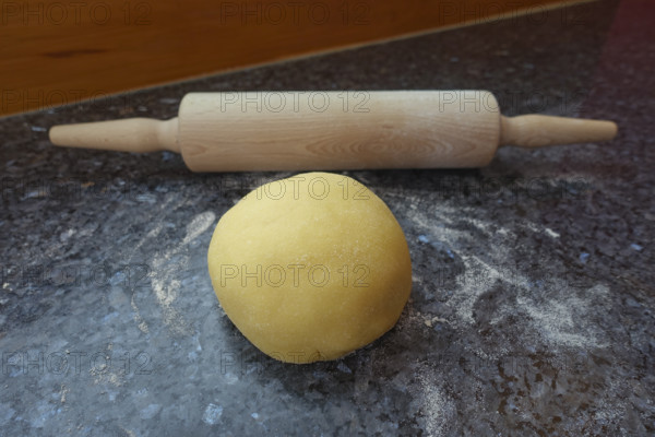 Southern German cuisine, preparation of shortcrust pastry, raw dough on the worktop, rolling pin, baking, out of the oven, vegetarian, flour, traditional cuisine, food photography, studio, Germany
