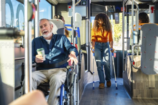 Senior man in a wheelchair and young woman using crutches traveling together on an accessible city bus, showing inclusion and support for diverse passengers