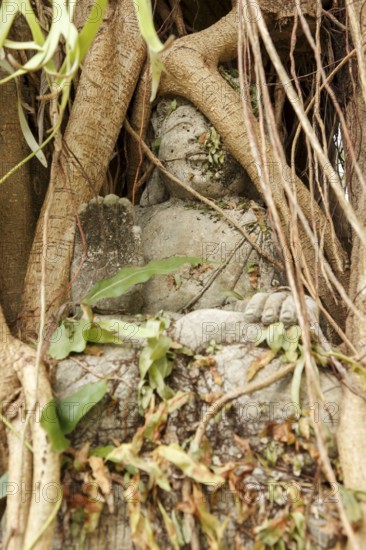 Stone sculpture covered with beads, Ubud, Bali, Indonesia