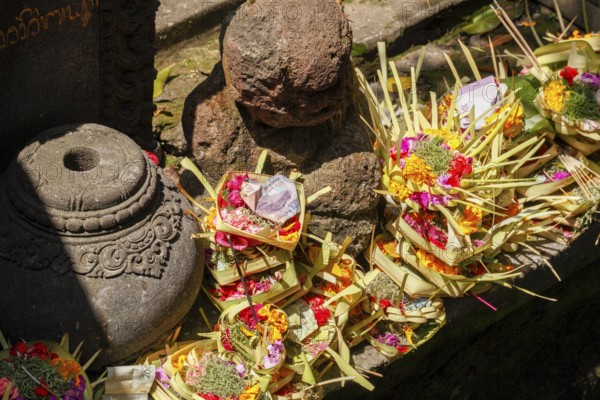 Offerings at the Hot Springs of Tirta Empul, Bali, IndonesiaSacrifices Baskets (Canang) at Tirta Empul Hot Springs, Indonesia