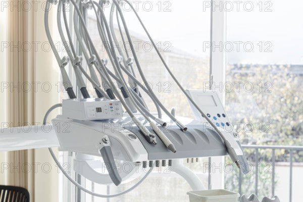Dental equipment, doctor's unit, module, in a bright clinic, with modern technology, no people, natural light