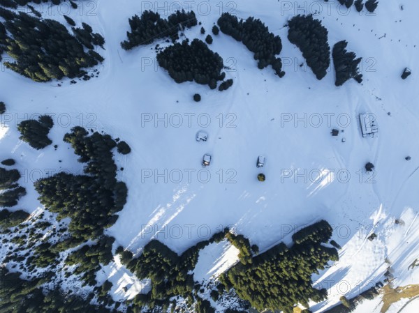 Top Down View, huts in a fantastic winter landscape, aerial view of the Wilder Kaiser ski area, Brixental, Tyrol, Austria