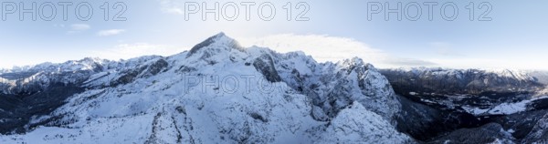 Wonderful winter landscape with Zugspitze, blue sky and snow, mountains and mountain valley, aerial view, Garmisch-Patenkirchen, Bavaria, Germany