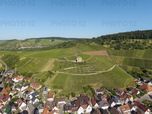 Town on the edge of the vineyards, with an old building in the center of the hills, Y-Burg, Stetten im Remstal, Baden-Württemberg, Germany