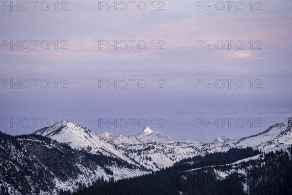 Summit of Grossglockner at sunset in winter, Hochbrixen, Brixen im Thale, Tyrol, Austria