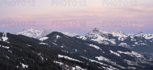 View of Brixental in winter, with peaks of the Kitzbühler Horn and Loferer Steinberge in the back, Hochbrixen, Brixen im Thale, Tyrol, Austria