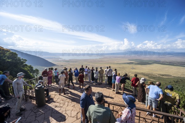 Tourists on the Crater Viewpoint observation deck, view of Ngorongoro Crater, Ngorongoro Conservation Area, Tanzania