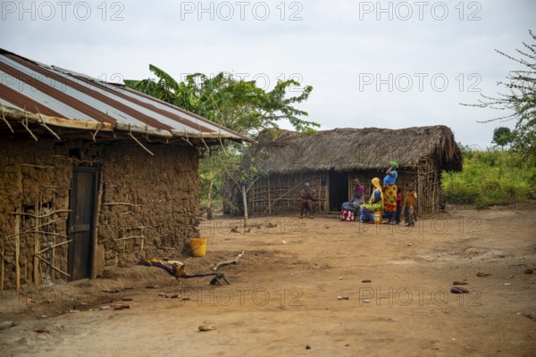 Villagers in a traditional village, mud huts, Sadaani, Tanzania