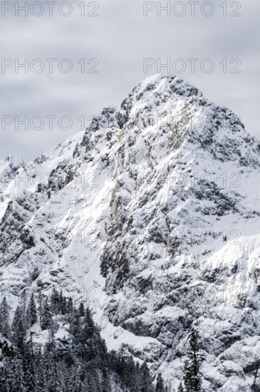 View of snowy Waxenstein summit, in winter, Wetterstein Mountains, Garmisch-Partenkirchen, Bavaria, Germany