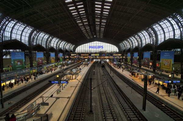 Interior view, trains, tracks, Philipps, logo, platform, travelers, advertising, advertising, Ritter Sport chocolate, main station, Free and Hanseatic City of Hamburg, Germany