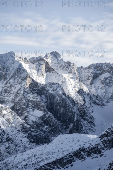 View of snowy peaks of Zugspitze, view from Längenfelderkopf in winter, Wetterstein Mountains, Garmisch-Partenkirchen, Bavaria, Germany