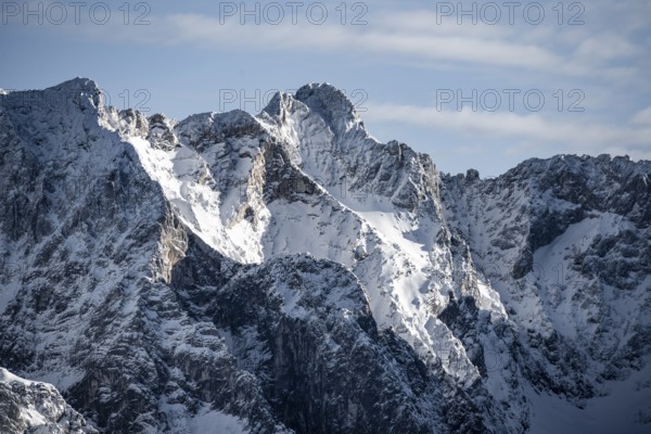 View of snowy peaks of Zugspitze, view from Längenfelderkopf in winter, Wetterstein Mountains, Garmisch-Partenkirchen, Bavaria, Germany