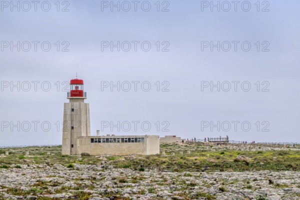 Old lighthouse of Fort Fortaleza de Sagres, national monument on the Ponta de Sagres high plateau 49 meters above sea level near the town of Sagres, Algarve, Portugal
