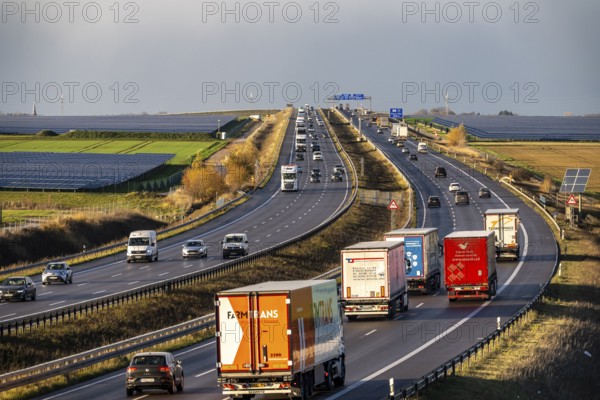 86.5 MW peak open-air photovoltaic systems, from RWE, with over 141, 000 solar modules, on a side strip, along the A44 motorway near Bedburg, at the Jackerath triangle, recultivated open-cast mining site, North Rhine-Westphalia, Germany