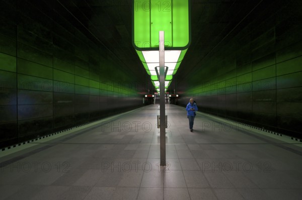 HafenCity University subway station, illuminated in color, green, travelers, platform, stop, train station, subway, public transport, HVV, Hamburger Verkehrsverbund, Hochbahn, public transport, Free and Hanseatic City of Hamburg, Germany