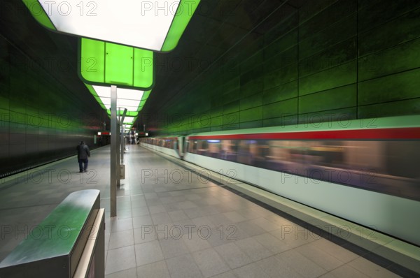 HafenCity University subway station, illuminated in color, green, underground train, movement effect, U4, travelers, platform, stop, train station, subway, public transport, HVV, Hamburger Verkehrsverbund, Hochbahn, public transport, Free and Hanseatic City of Hamburg, Germany