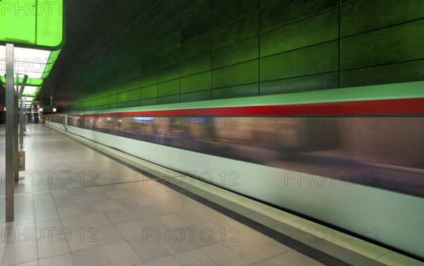 HafenCity University underground station, illuminated in color, green, underground train, movement effect, U4, empty, platform, train station, subway, public transport, HVV, Hamburger Verkehrsverbund, elevated railway, public transport, Free and Hanseatic City of Hamburg, Germany