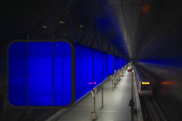HafenCity University subway station, illuminated in color, blue, underground train, movement effect, U4, travelers, platform, stop, train station, subway, public transport, HVV, Hamburger Verkehrsverbund, Hochbahn, public transport, Free and Hanseatic City of Hamburg, Germany