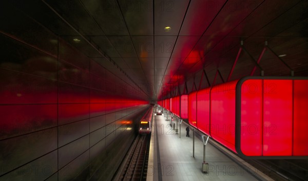 HafenCity University subway station, illuminated in color, red, underground train, movement effect, U4, travelers, platform, stop, train station, subway, public transport, HVV, Hamburger Verkehrsverbund, Hochbahn, public transport, Free and Hanseatic City of Hamburg, Germany