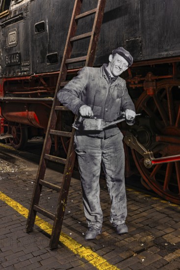 Replica of a railroad mechanic in work clothes with oil can, railway museum, Augsburg railway park, administrative district of Swabia, Bavaria, Germany