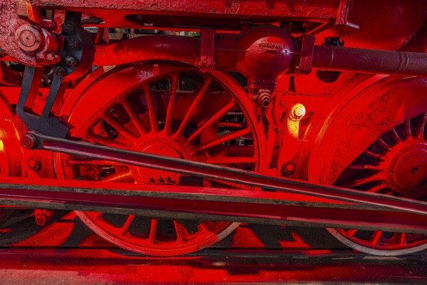 Illuminated wheelwork of a historic locomotive, railway museum, Augsburg railway park, administrative district of Swabia, Bavaria, Germany