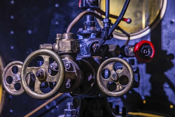 Levers and actuators in the tank car of a historic steam locomotive, Eisenbahnmuseum, Augsburg railway park, administrative district of Swabia, Bavaria, Germany