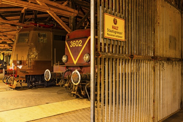 Legendary Italian locomotive E 636 and the historic electric locomotive 3602 of the 1st generation, replica of the former border crossing in Berlin Friedrichstraße, railway museum, Augsburg railway park, administrative district of Swabia, Bavaria, Germany