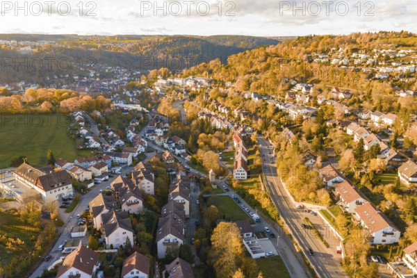 Long-range aerial view of an urban landscape in autumn light, Calw, Black Forest, Germany