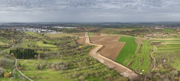 Panoramic picture of an extensive rural landscape under a grey sky, construction site, the South German Natural Gas Pipeline (SEL) is being built in the Rems Valley and the surrounding area, which will initially transport natural gas and later hydrogen, Waiblingen-Neustadt, Hohenacker, Baden-Württemberg, Germany