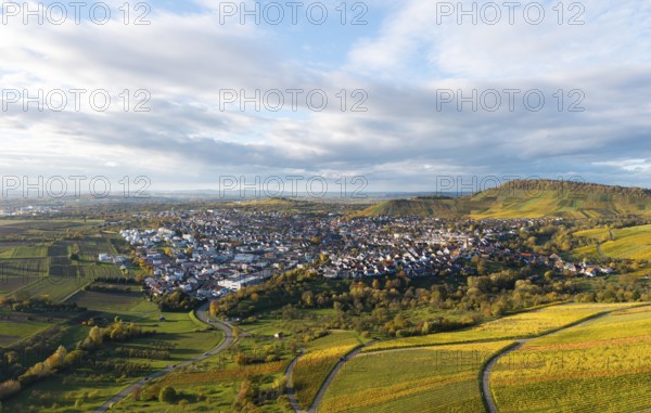 Panoramic view of a village with surrounding vineyards and hills under cloudy sky, autumn, Korb-Steinreinach im Remstal, Baden-Württemberg, Germany
