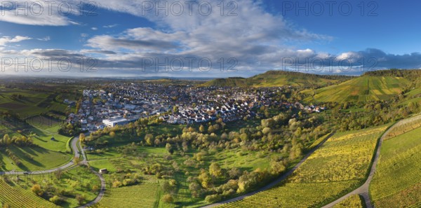 Aerial view of a village on hilly terrain with green fields and cloudy sky, autumn, Korb-Steinreinach im Remstal, Baden-Württemberg, Germany
