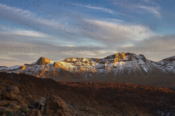 Mountains in the light of sunrise with soft clouds in the sky, UNESCO World Heritage Site, Teide National Park, Tenerife, Canary Islands, Spain