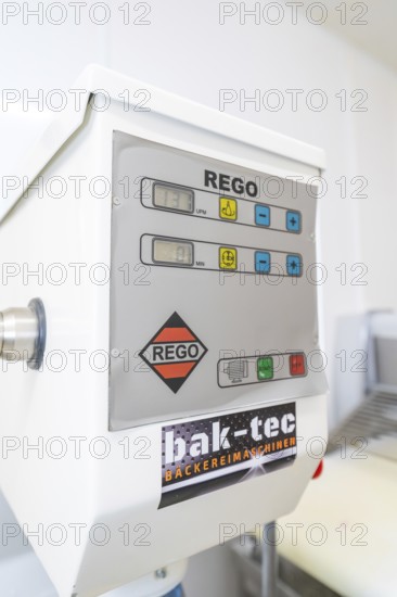 Close-up of a rego bakery machine with various control buttons in a bakery, Weihnachtsbacken, Haselstaller Hof, Wildberg, Germany