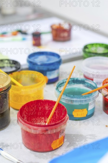 Colourful painting supplies in colorful plastic containers on a table, Christmas baking, Haselstaller Hof, Wildberg, Germany