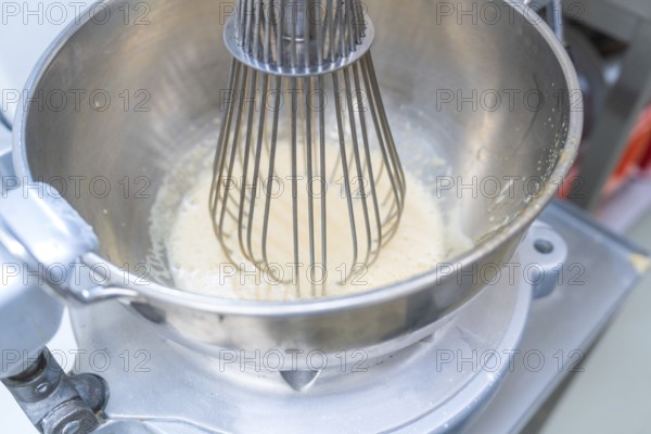 A metal mixing machine processes a light dough, Christmas baking, Haselstaller Hof, Wildberg, Germany