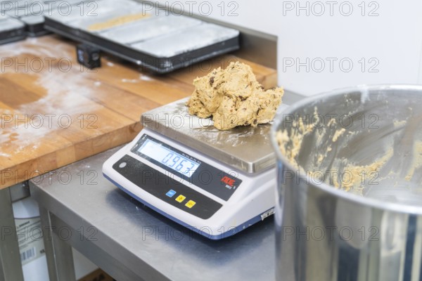Dough on a digital scale in a kitchen, preparation for baking, Christmas baking, Haselstaller Hof, Wildberg, Germany