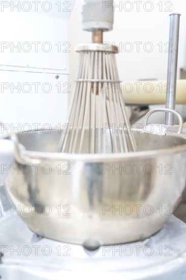 A large industrial metal mixing machine in a production kitchen, Weihnachtsbacken, Haselstaller Hof, Wildberg, Germany