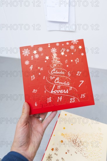 Red advent calendar for chocolate lovers with printed snowflakes, Christmas baking, Haselstaller Hof, Wildberg, Germany