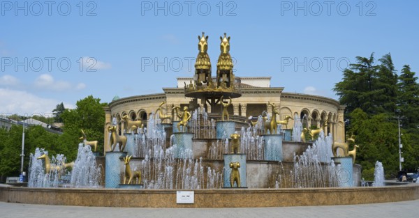 Large fountain with golden statues in an architectural and green setting, Colchis Fountain, David Aghmashenebeli Central Square, Kutaisi, Imereti Region, Georgia
