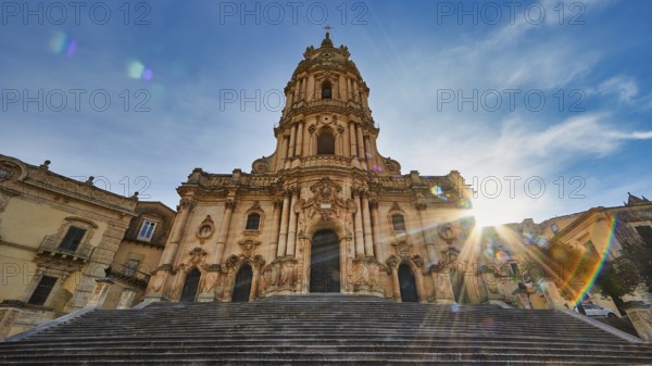 Duomo di San Giorgio, St. George's Cathedral, Modica, impressive Baroque church at sunset with brilliant lighting effect, Baroque towns of Sicily, Baroque corner of Sicily, late Baroque towns of Val di Noto, UNESCO World Heritage Site, Sicily, Italy