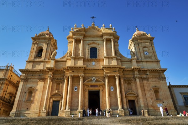 Noto, large baroque church with magnificent façade, stairs leading to the entrance, Baroque towns of Sicily, Baroque corner of Sicily, late Baroque towns of Val di Noto, UNESCO World Heritage Site, Sicily, Italy