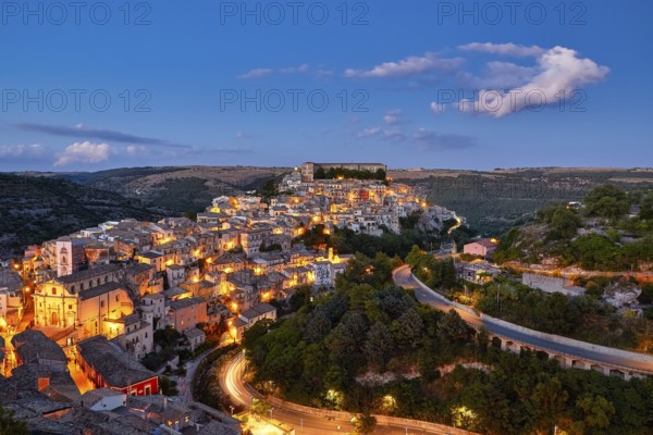 Ragusa, panoramic view of an illuminated city on a hill at night, Baroque towns of Sicily, Baroque corner of Sicily, late Baroque towns of Val di Noto, UNESCO World Heritage Site, Sicily, Italy