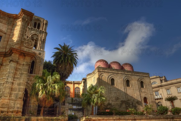 Arab-Norman historic building with red domes surrounded by palm trees under clear blue sky, Palermo, San Cataldo Church, UNESCO World Heritage Site, Sicily, Italy