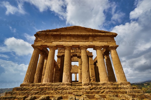Temple of Concordia, imposing ancient temple with columns under a blue sky, Valley of the Temples, Valle dei Templi, Archaeological Site, UNESCO World Heritage Site, Agrigento, Sicily, Italy
