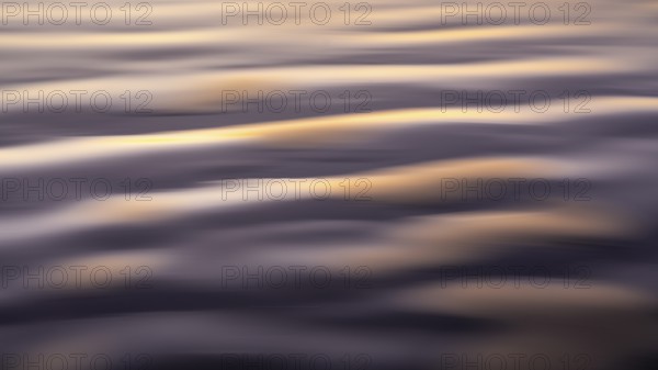 Ocean waves in evening light, long exposure with ICM (Intentional Camera Movement)