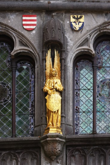 Golden Angel, figure on the façade of the St. Ivo Chapel at the Basilica of the Holy Blood, Castle Square in the historic old town, Bruges, UNESCO World Heritage Site, Flanders, Belgium