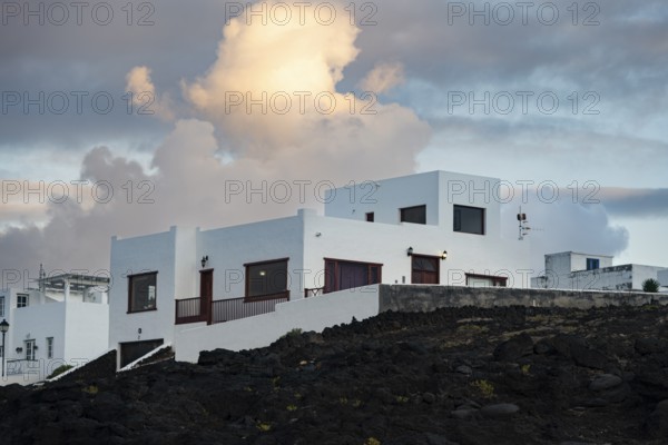 Typical white houses in the town of La Santa, at sunset, Lanzarote, Canary Islands, Spain