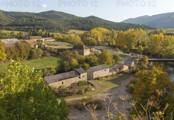 Farm buildings barns autumn landscape village of Echo or Hecho, Valle de Hecho, Huesca province, Aragon, Spain