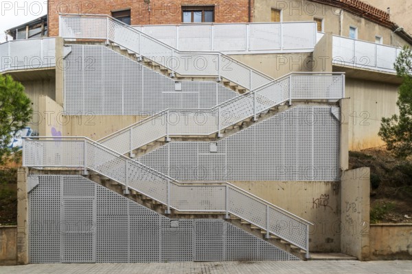 Metal staircase street climbing up steep hillside, city of Teruel, Aragon, Spain