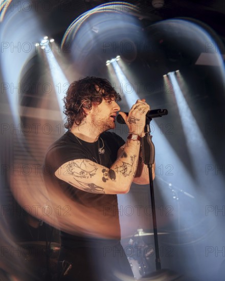 Tom Grennan live on Grennan '25 tour at Bi Nuu in Berlin on 13.11.2025 Note: the photo was taken through a pane of glass